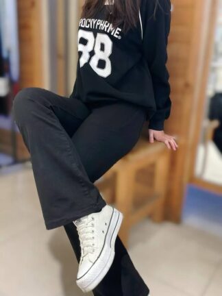 黑色素面喇叭褲