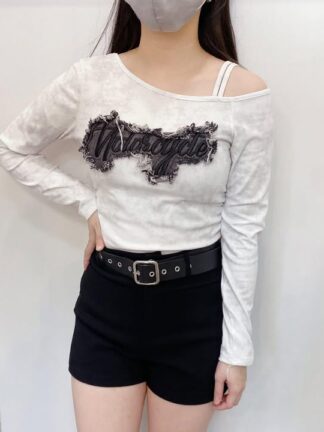 不對稱領口拼接造型短版上衣