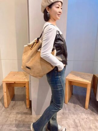 麂皮毛邊造型包包