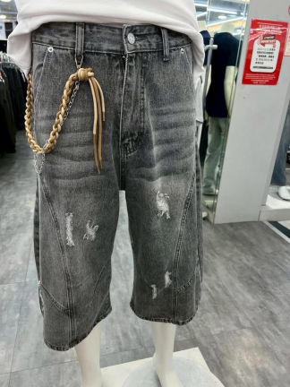 拼接牛仔彎刀短褲